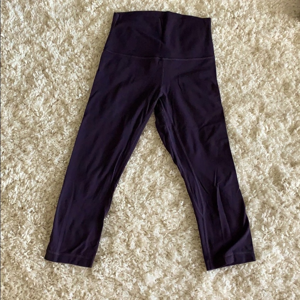 Purple lululemon Align cropped leggings.